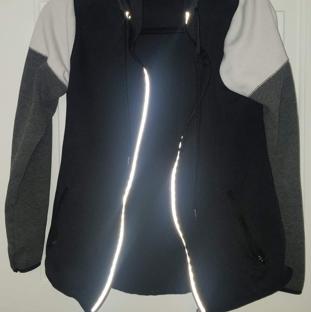 Mutli-shaded color jacket with reflective strips